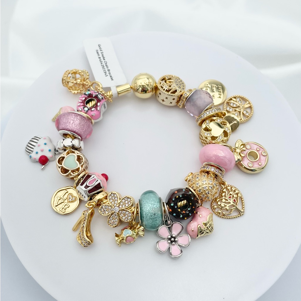 Linx Yellow Gold Snake Chain Bracelet With Gold Pastel And Sweets Themed Charms
